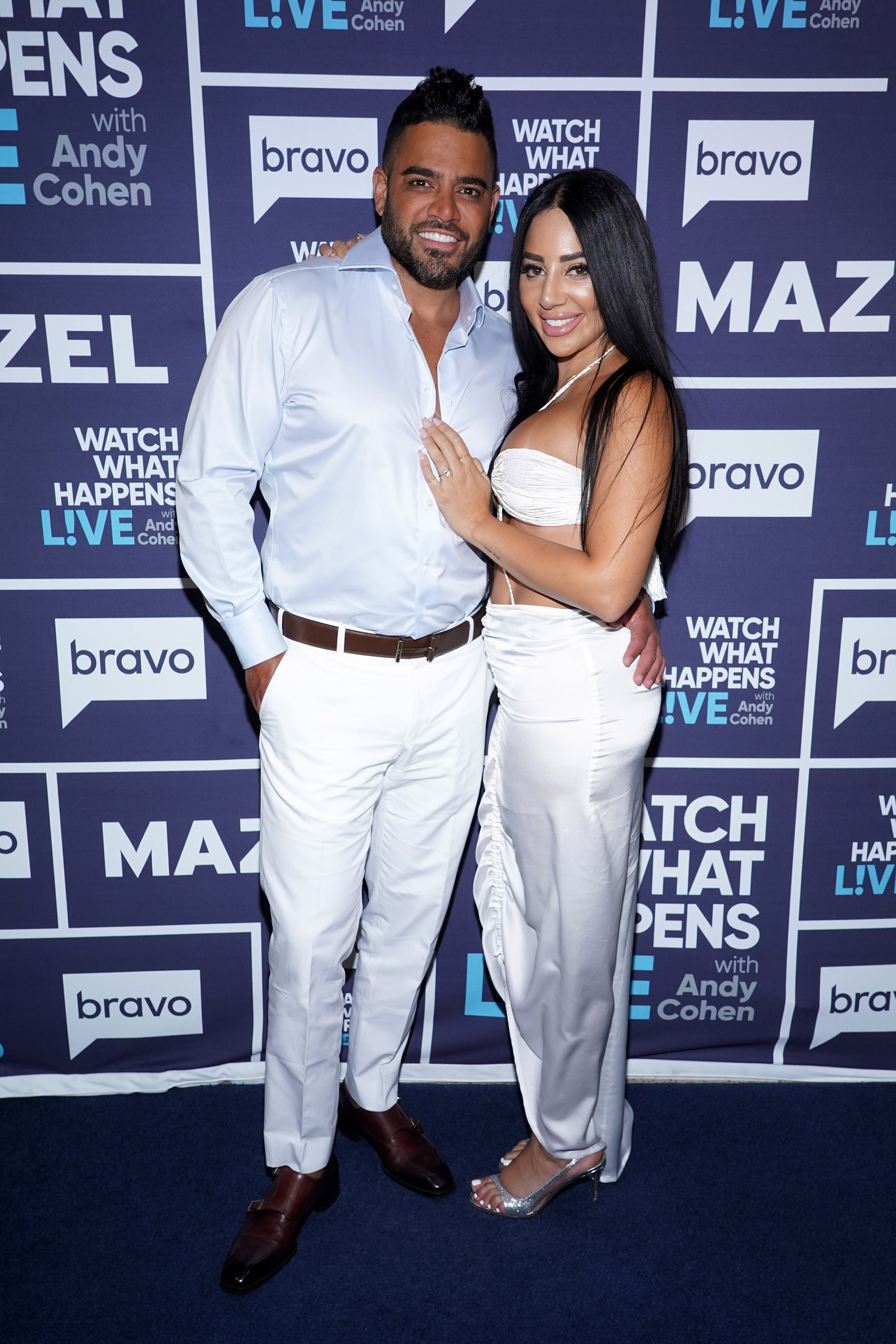 Mike Shouhed and Paulina Ben-Cohen posing for an episode of